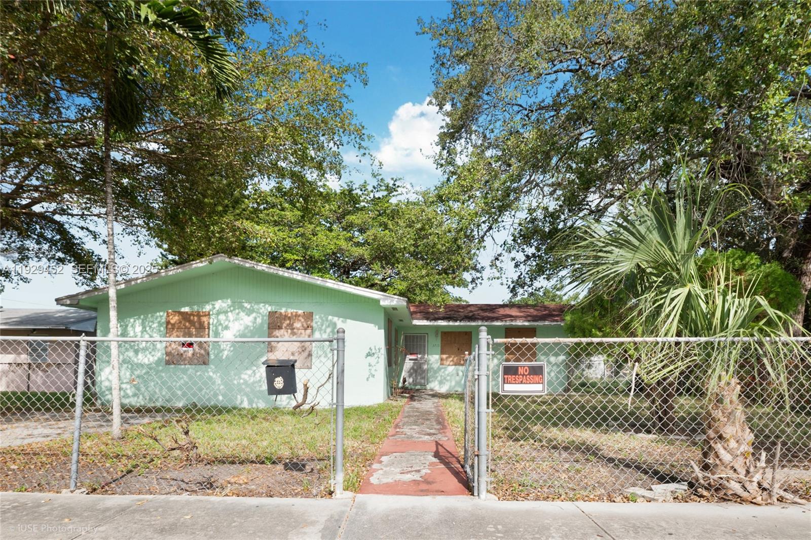 3715 Oak Avenue Miami, FL 33133 - Photo 9 of 26 a front view of a house with garden