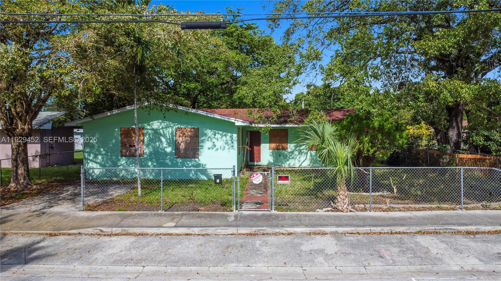 3715 Oak Avenue Miami, FL 33133 - Photo 10 of 26 a front view of a house with garden
