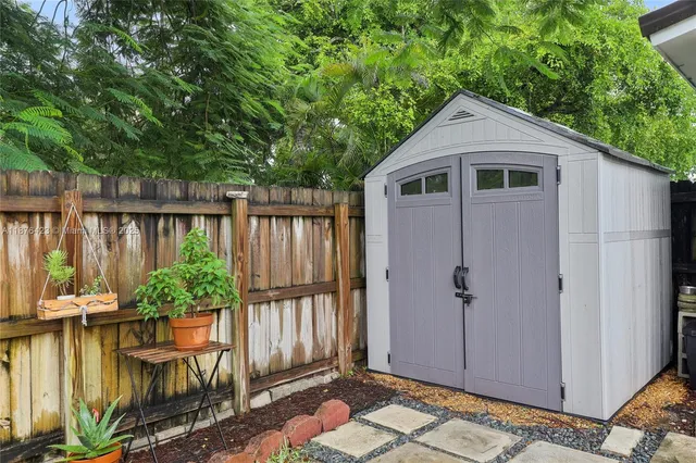 a balcony with wooden floor and outdoor space