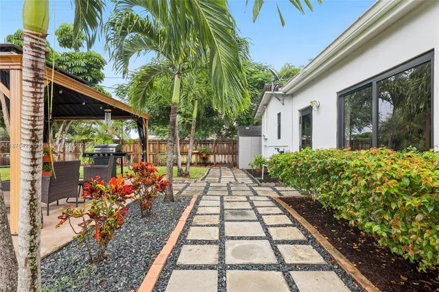 a view of a garden with pathway