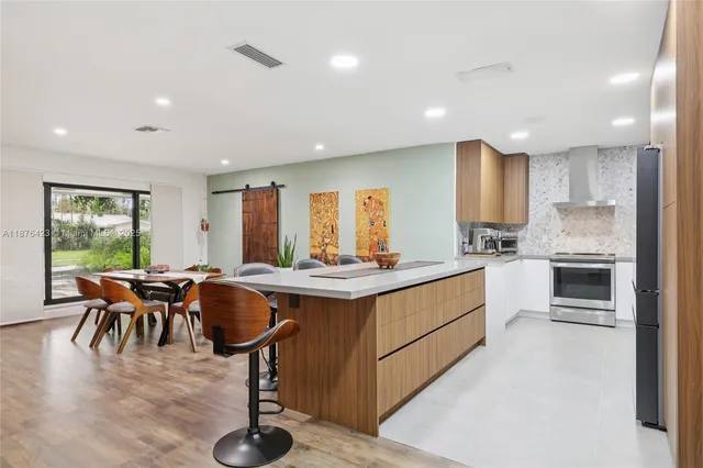a kitchen with counter top space and appliances