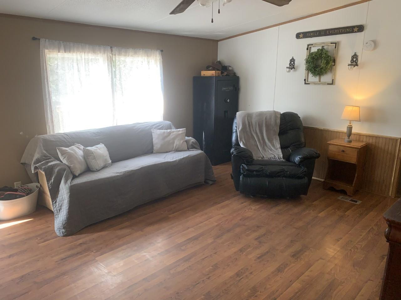 1073 Friendship Road Shawsville, VA 24162 - Photo 2 of 11 a living room with furniture and a window