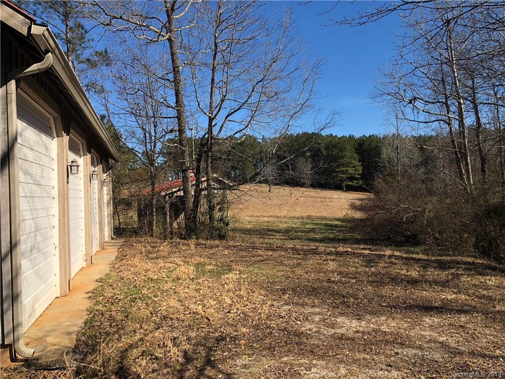 999 Collinsville Road Columbus, NC 28722 - Photo 15 of 16 a view of a backyard of the house