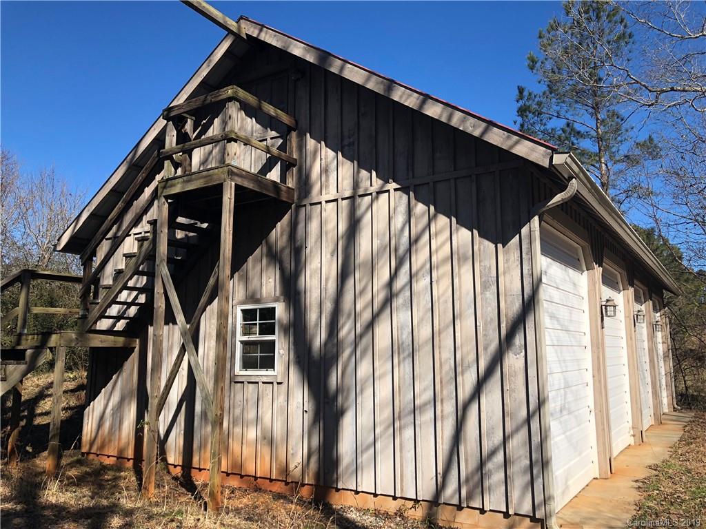 999 Collinsville Road Columbus, NC 28722 - Photo 6 of 16 a view of a wooden door