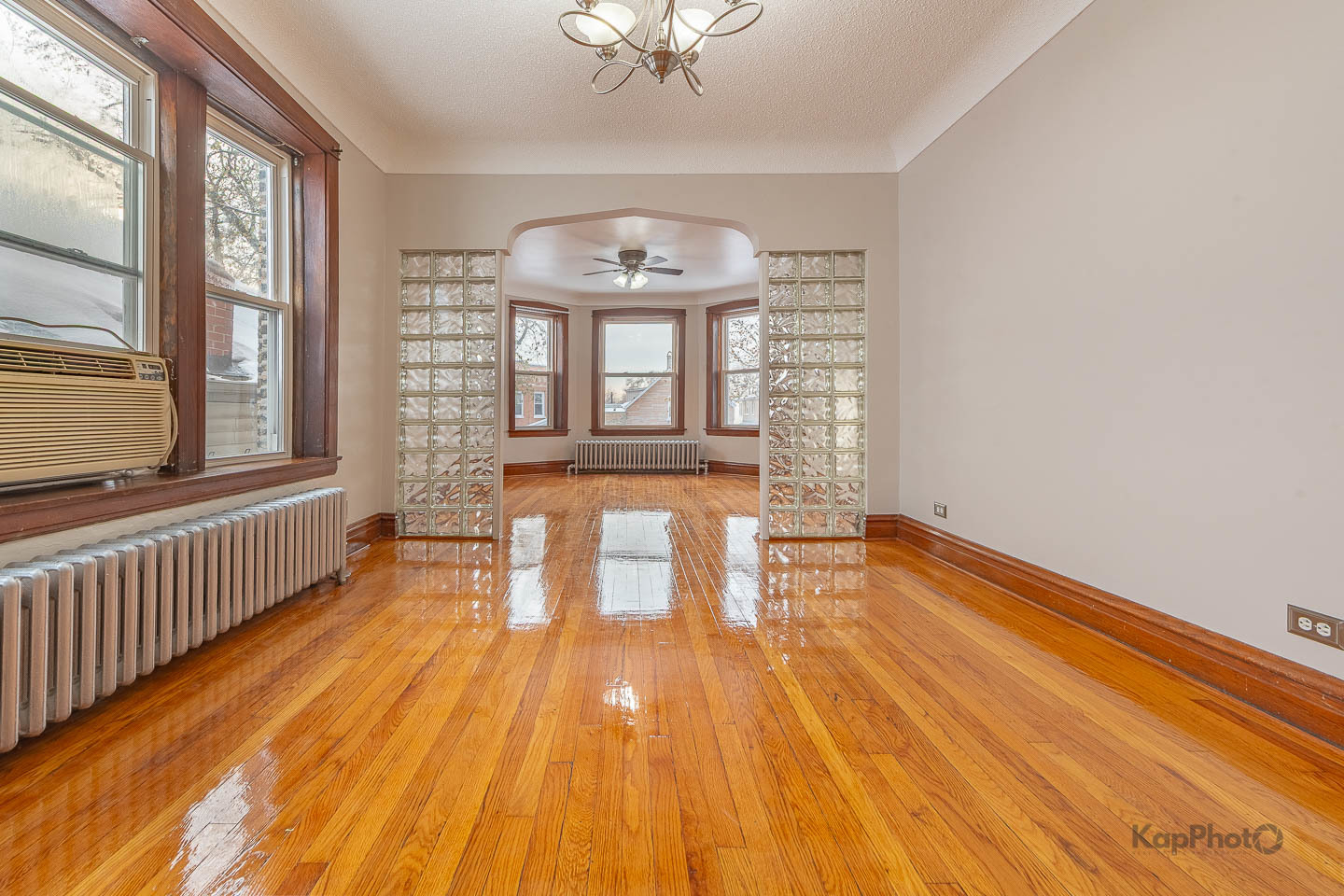 3530 West Evergreen Avenue, Unit 2 Chicago, IL 60651 - Photo 11 of 25 a view of a room with wooden floor and a window