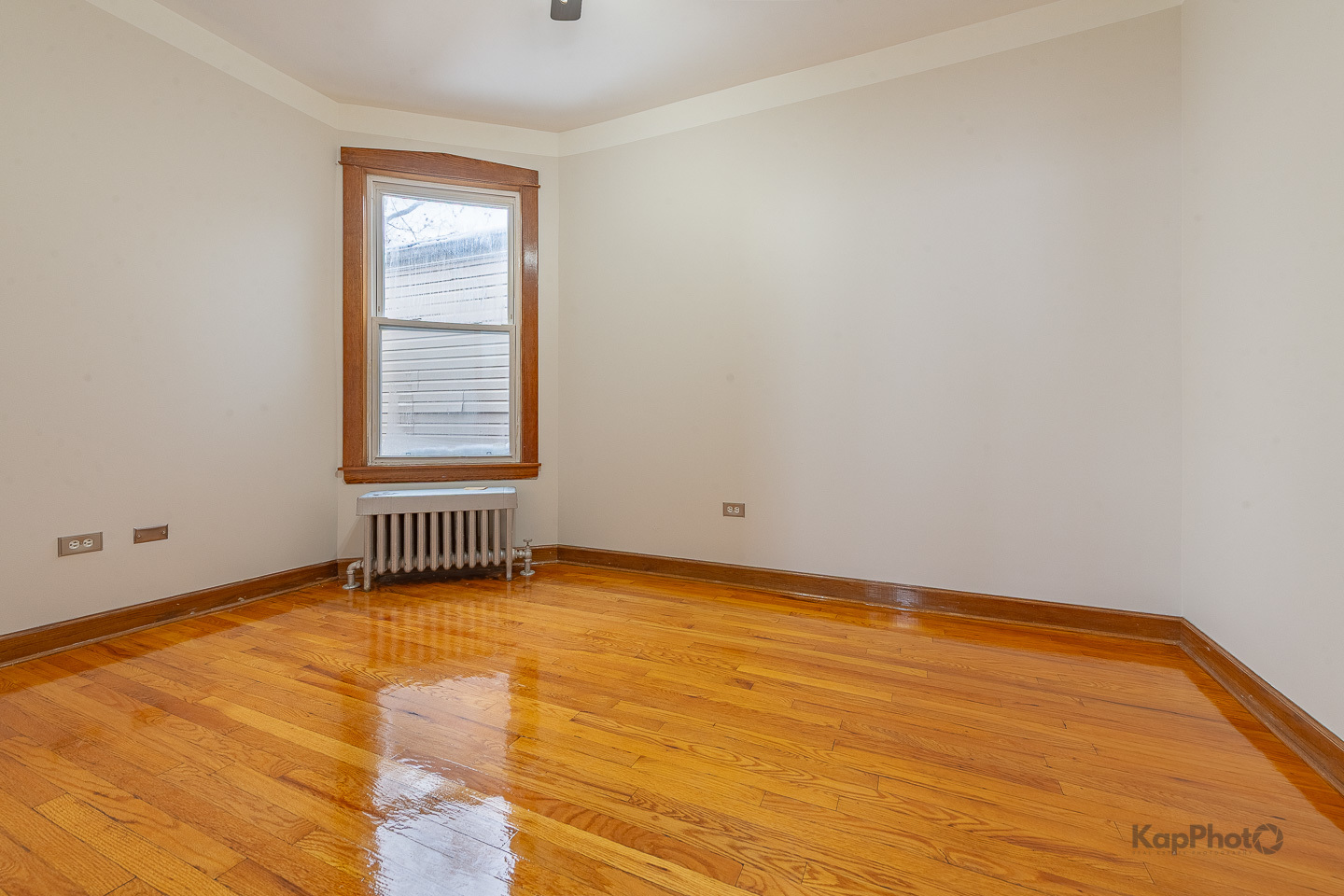 3530 West Evergreen Avenue, Unit 2 Chicago, IL 60651 - Photo 17 of 25 a view of an empty room and window