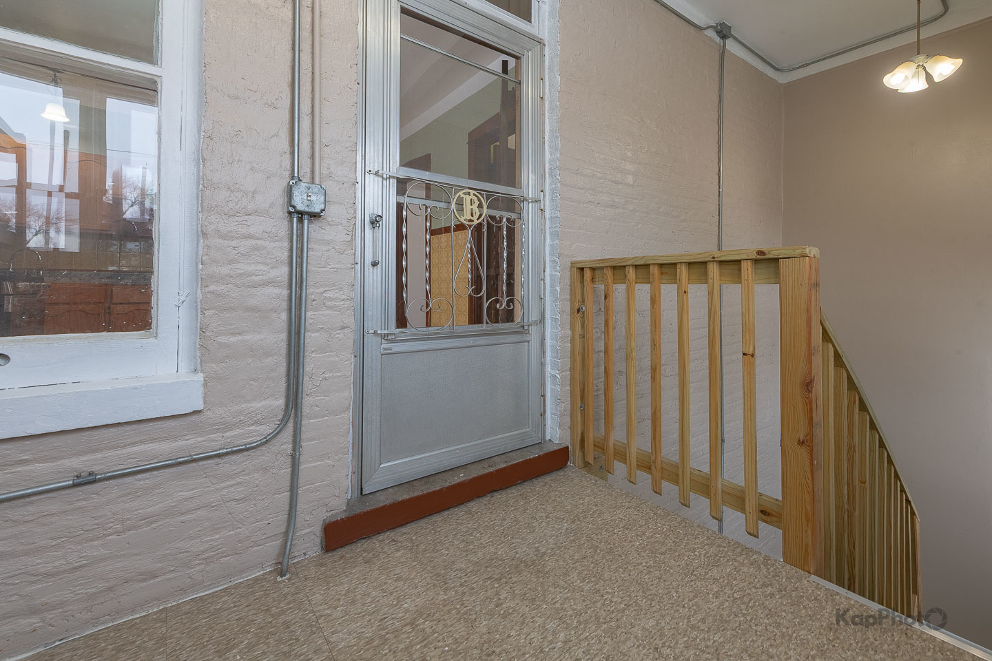 3530 West Evergreen Avenue, Unit 2 Chicago, IL 60651 - Photo 25 of 25 a view of a hallway with entryway and wooden floor