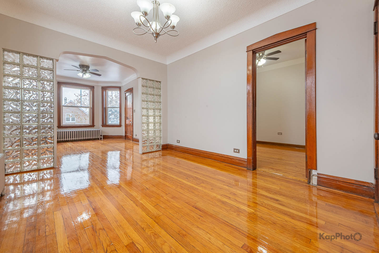 3530 West Evergreen Avenue, Unit 2 Chicago, IL 60651 - Photo 10 of 25 a view of an empty room with wooden floor and a window