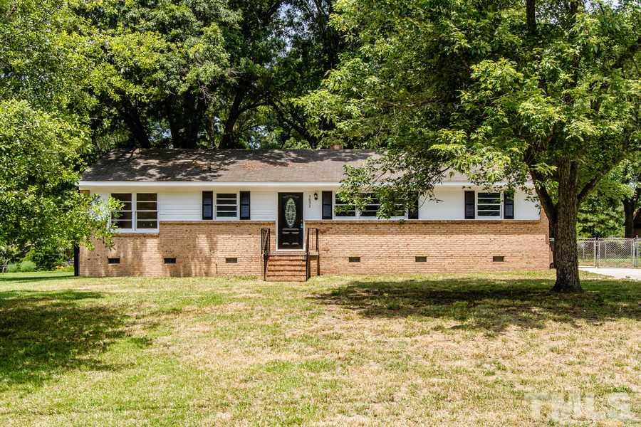 3832 Corwin Road Garner, NC 27529 - Photo 2 of 21 a view of a house with a yard