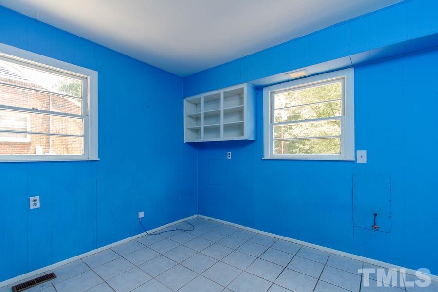 3832 Corwin Road Garner, NC 27529 - Photo 14 of 21 a view of an empty room with window