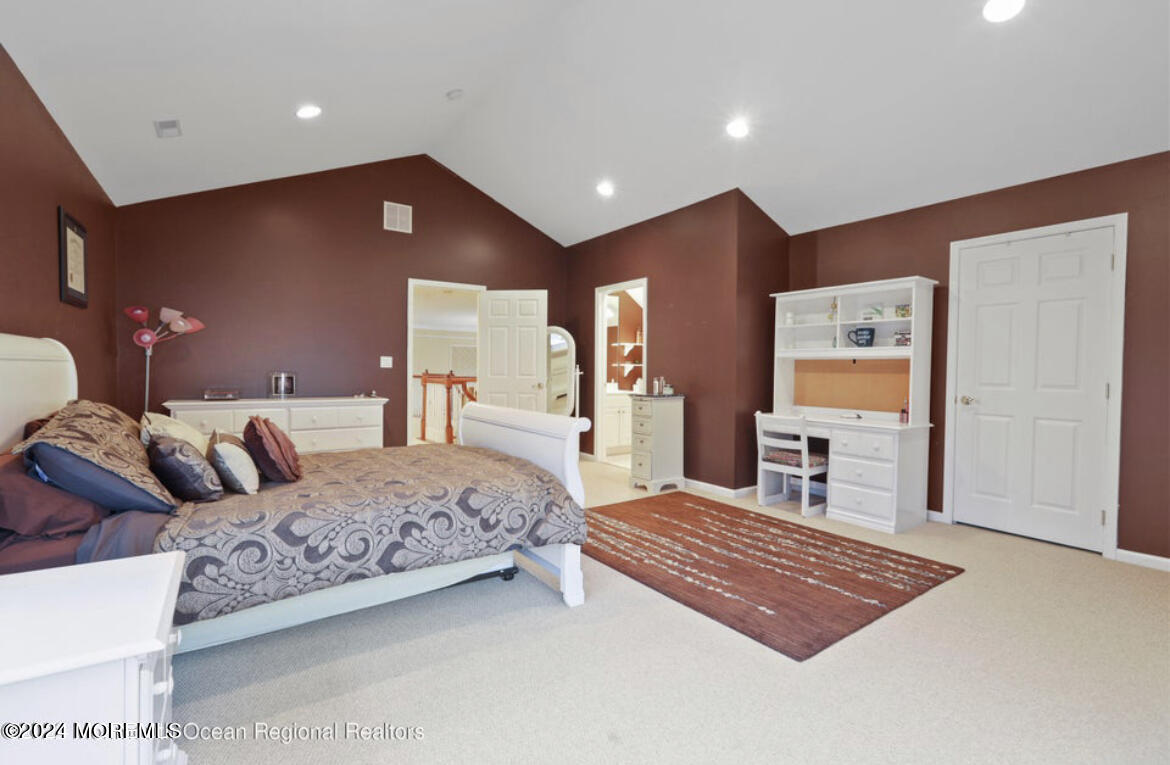 29 Northwoods Road Asbury Park, NJ 07712 - Photo 17 of 34 a bedroom with a bed and dresser
