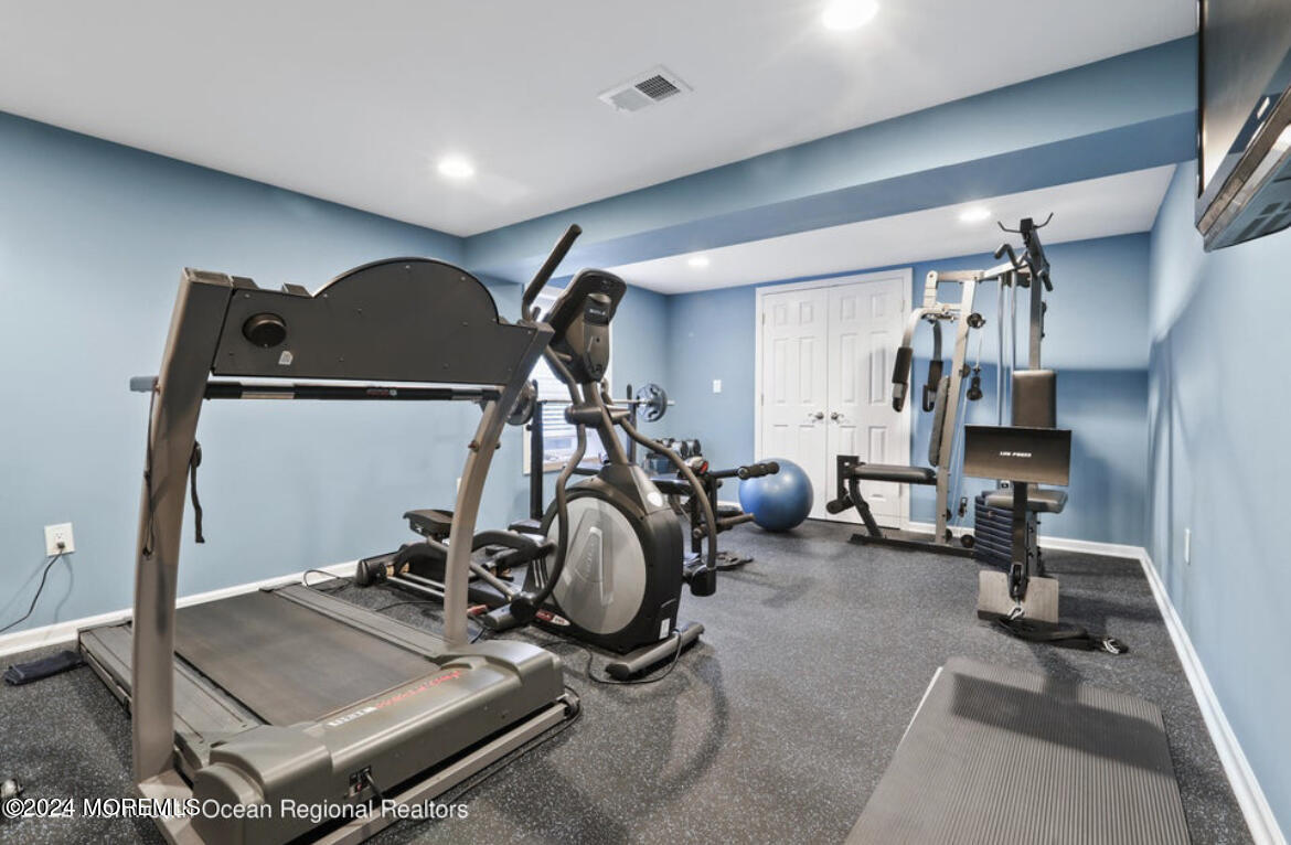 29 Northwoods Road Asbury Park, NJ 07712 - Photo 30 of 34 a view of a room with gym equipment