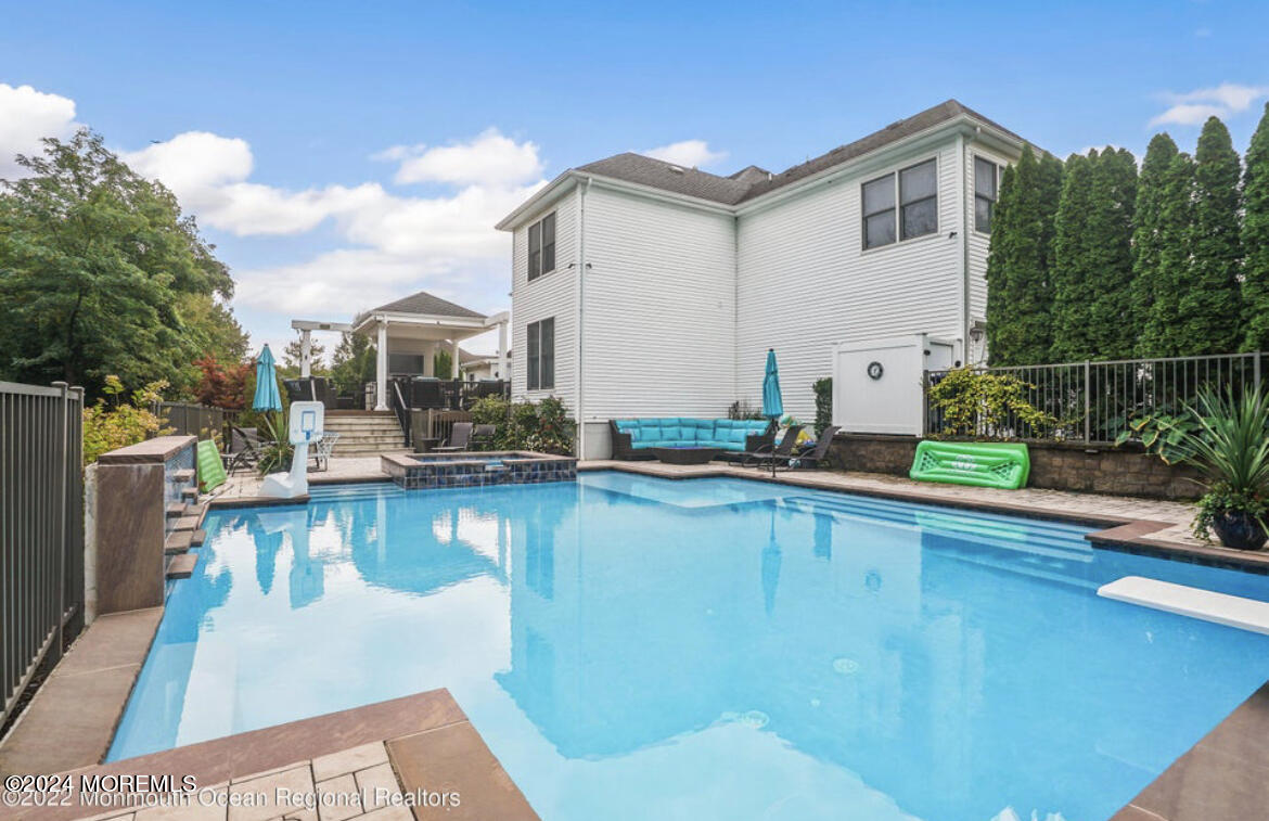 29 Northwoods Road Asbury Park, NJ 07712 - Photo 31 of 34 a view of a house with pool
