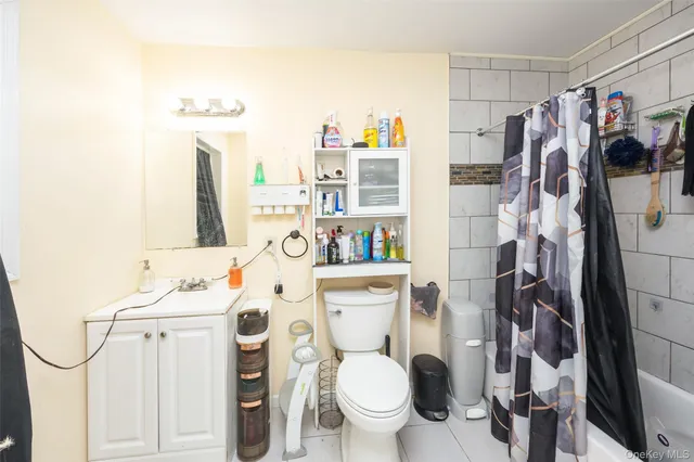 a view of a garage with a bike and car