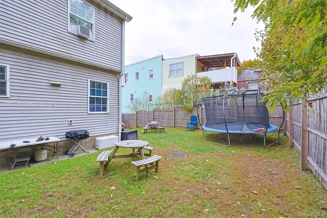 a front view of house with yard and seating area