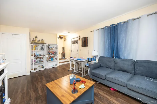 a living room with furniture and a couch