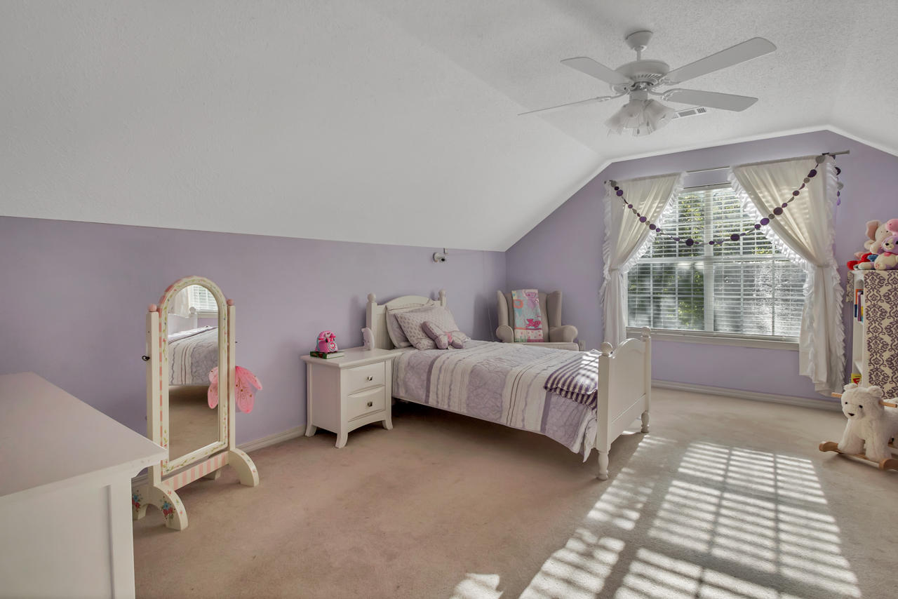 1830 Huntington Road Niceville, FL 32578 - Photo 30 of 35 a bedroom with a bed and a window