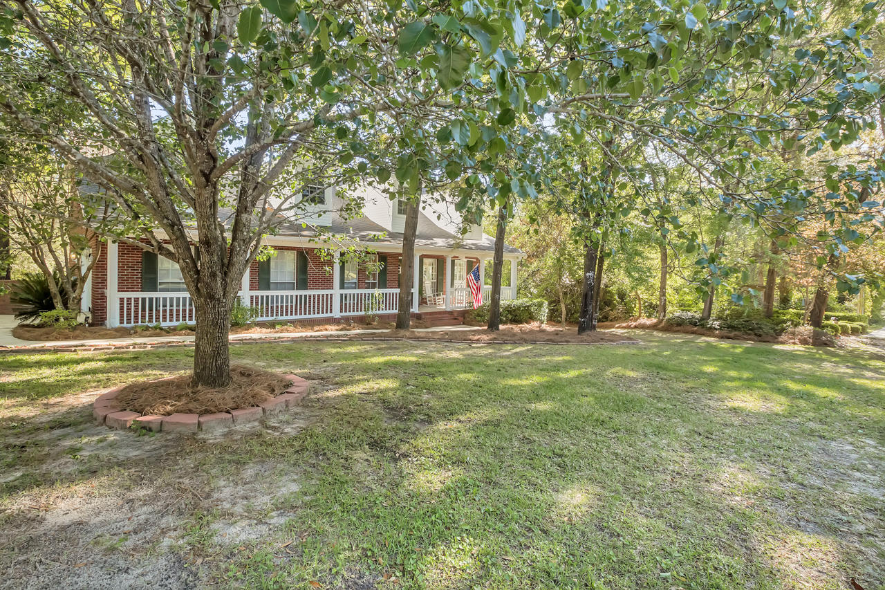 1830 Huntington Road Niceville, FL 32578 - Photo 32 of 35 a house with lots of trees