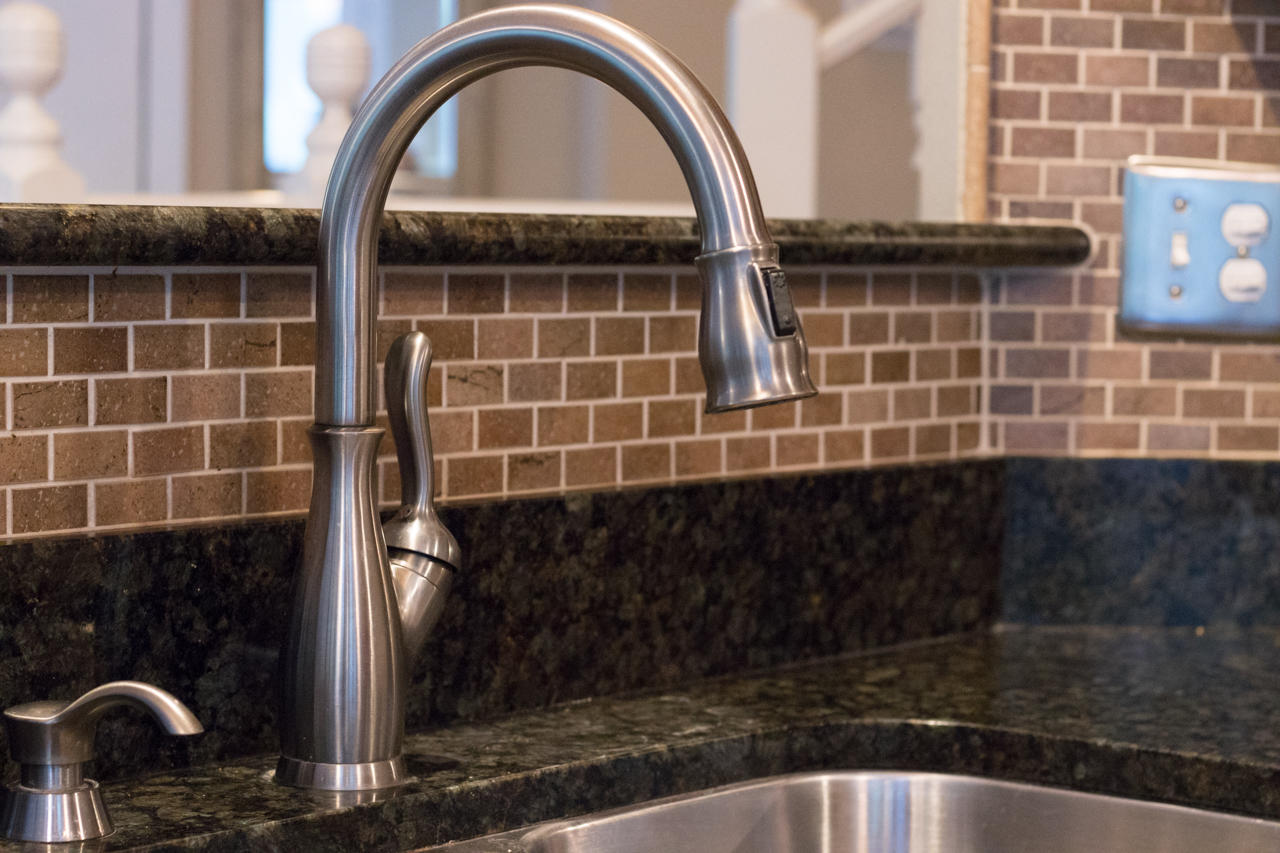 1830 Huntington Road Niceville, FL 32578 - Photo 9 of 35 a bathroom with a granite countertop sink