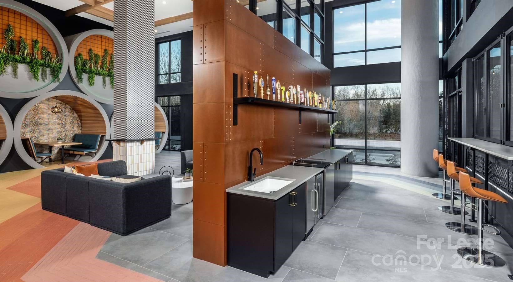 1015 North Alexander Street, Unit B5 Charlotte, NC 28206 - Photo 12 of 31 an outdoor living room with furniture and a floor to ceiling window