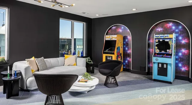 a kitchen that has a sink and a stove in it