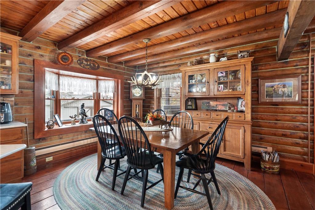 215 Shilo Ridge Drive Export, PA 15632 - Photo 11 of 48 a view of a dining room with furniture window and wooden floor