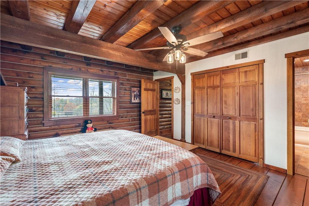 215 Shilo Ridge Drive Export, PA 15632 - Photo 14 of 48 a bed sitting in a spacious bedroom next to a window