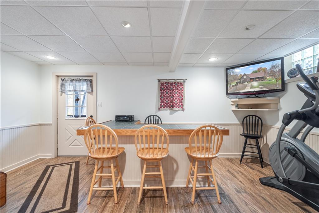 215 Shilo Ridge Drive Export, PA 15632 - Photo 23 of 48 a view of a dining room with furniture wooden floor and chandelier