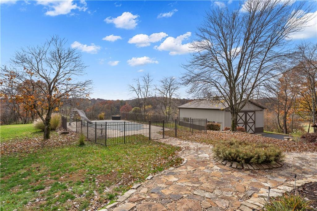 215 Shilo Ridge Drive Export, PA 15632 - Photo 29 of 48 a view of a backyard with a tree