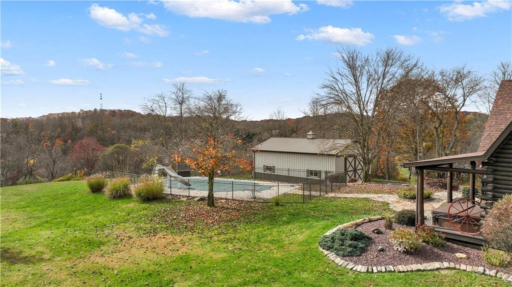 215 Shilo Ridge Drive Export, PA 15632 - Photo 41 of 48 a front view of a house with garden