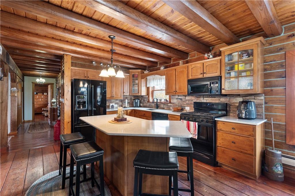 215 Shilo Ridge Drive Export, PA 15632 - Photo 9 of 48 a large kitchen with a table and chairs