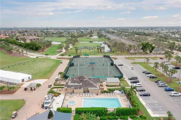 an aerial view of a house with a lake view