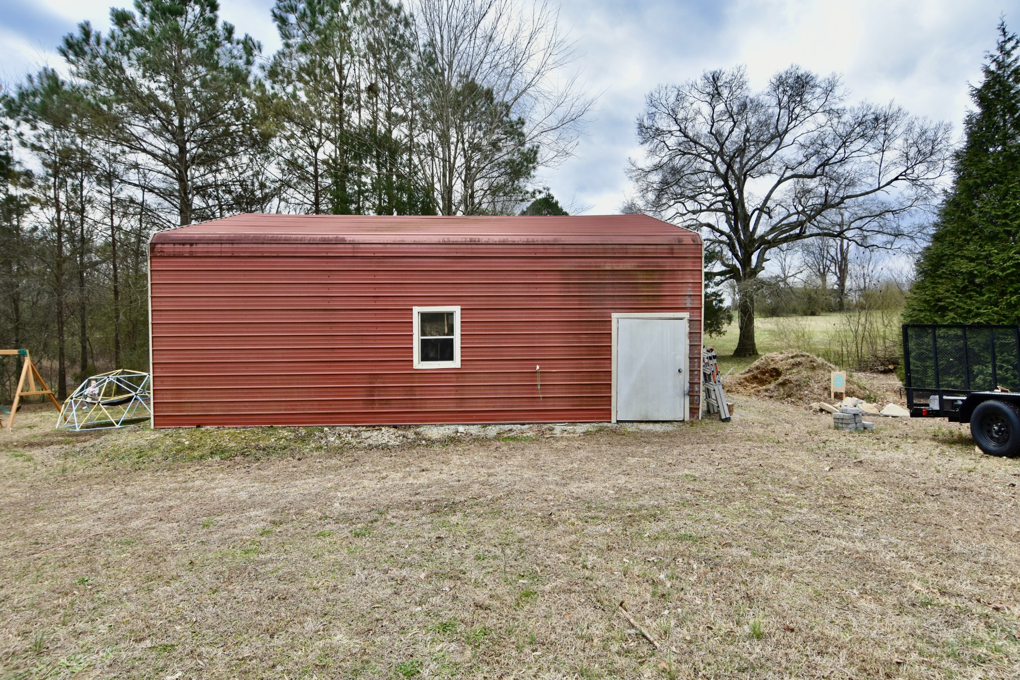 412 Eells Street Loretto, TN 38469 - Photo 7 of 19 a view of a house with a yard