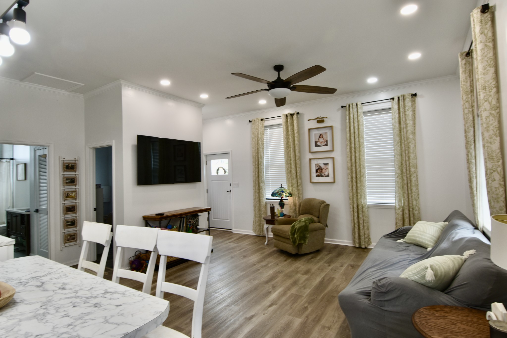 412 Eells Street Loretto, TN 38469 - Photo 9 of 19 a living room with furniture and a flat screen tv