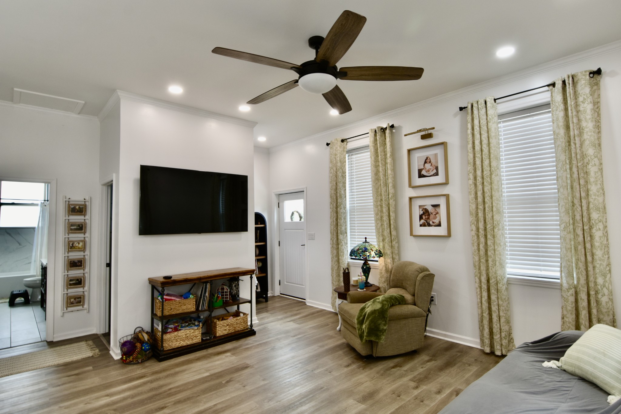 412 Eells Street Loretto, TN 38469 - Photo 10 of 19 a living room with furniture and a flat screen tv
