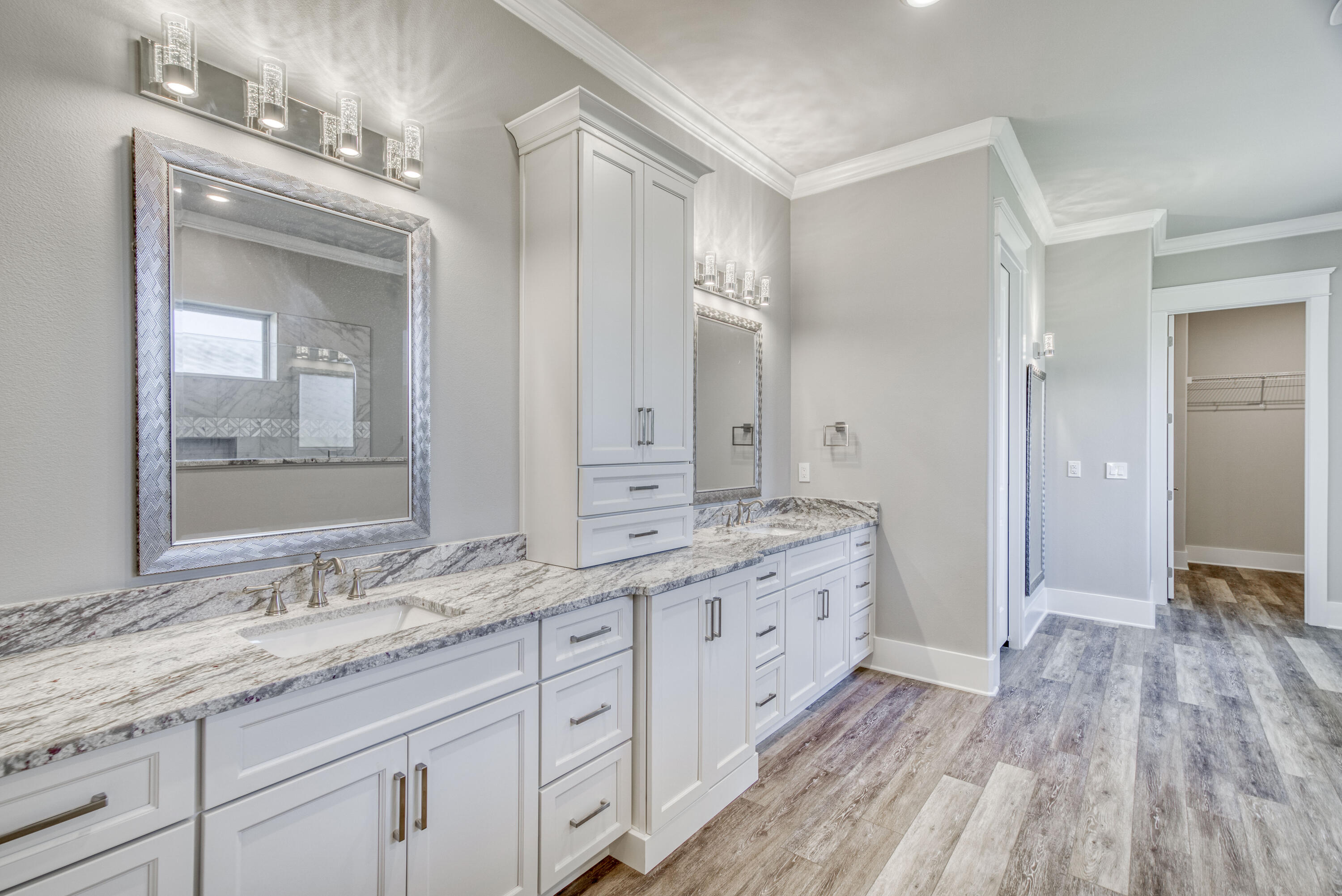 2864 P.G.A Boulevard Navarre, FL 32566 - Photo 20 of 52 a bathroom with a granite countertop double vanity sink mirror and