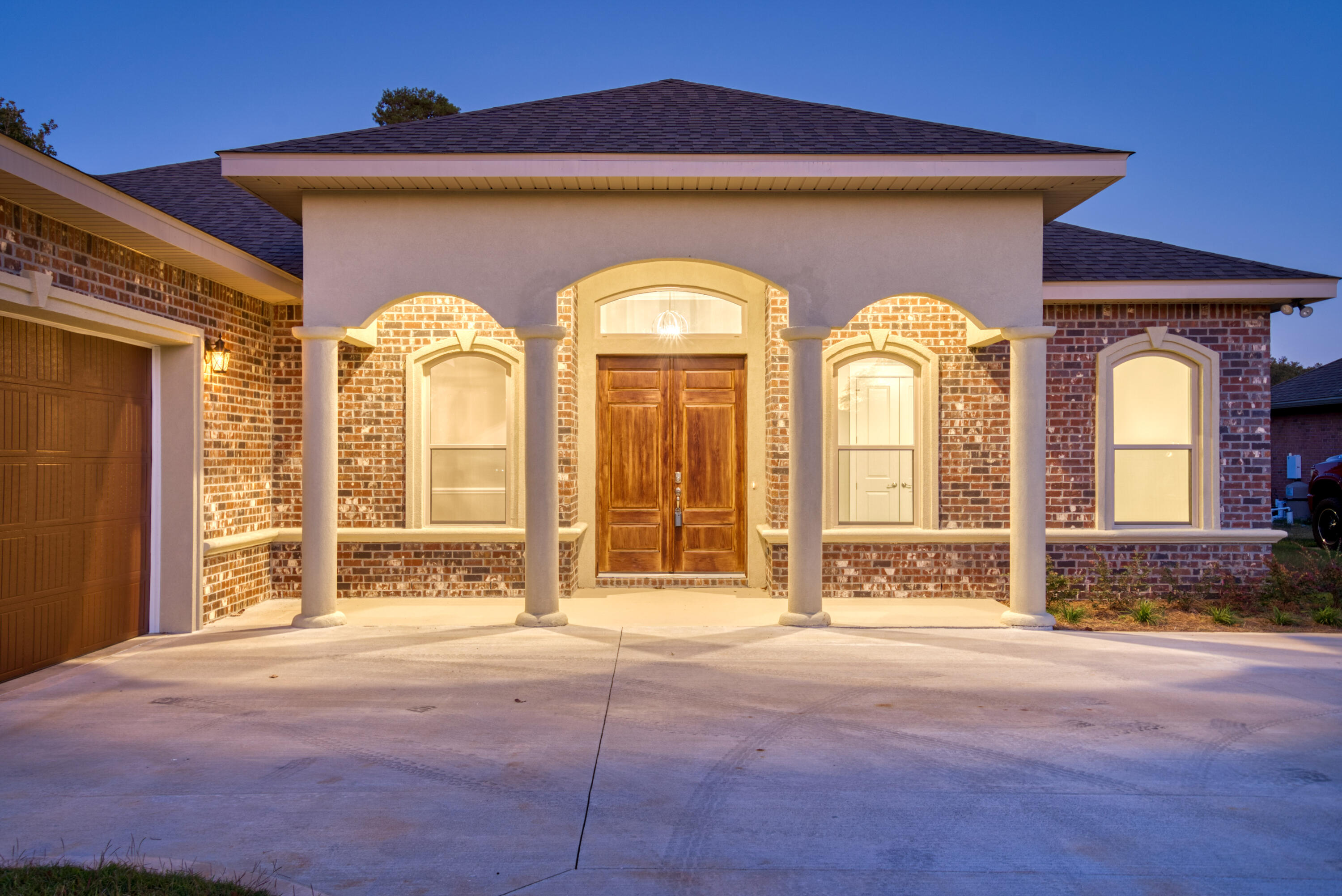 2864 P.G.A Boulevard Navarre, FL 32566 - Photo 2 of 52 a front view of a house