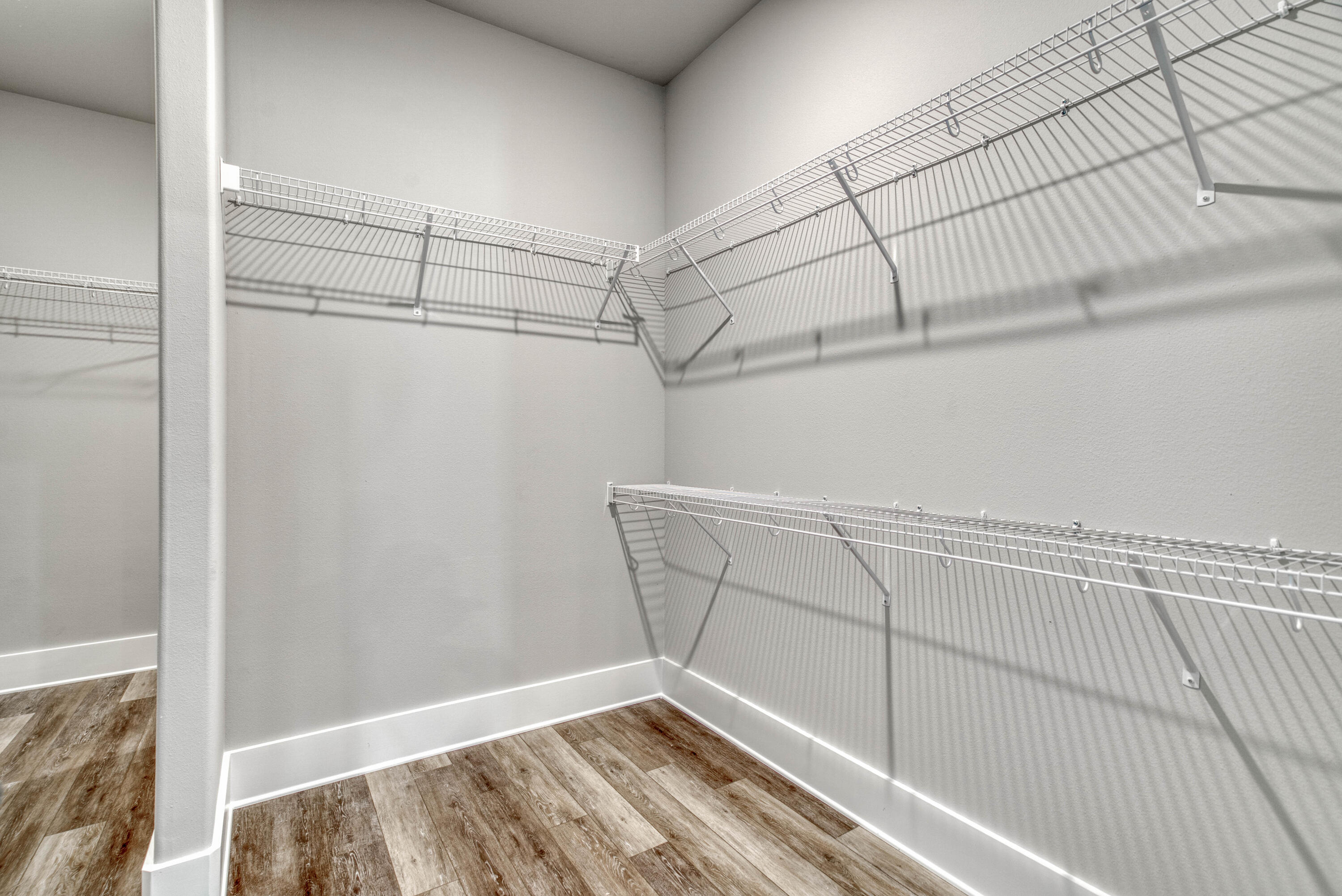 2864 P.G.A Boulevard Navarre, FL 32566 - Photo 24 of 52 a view of a room with racks on the wall