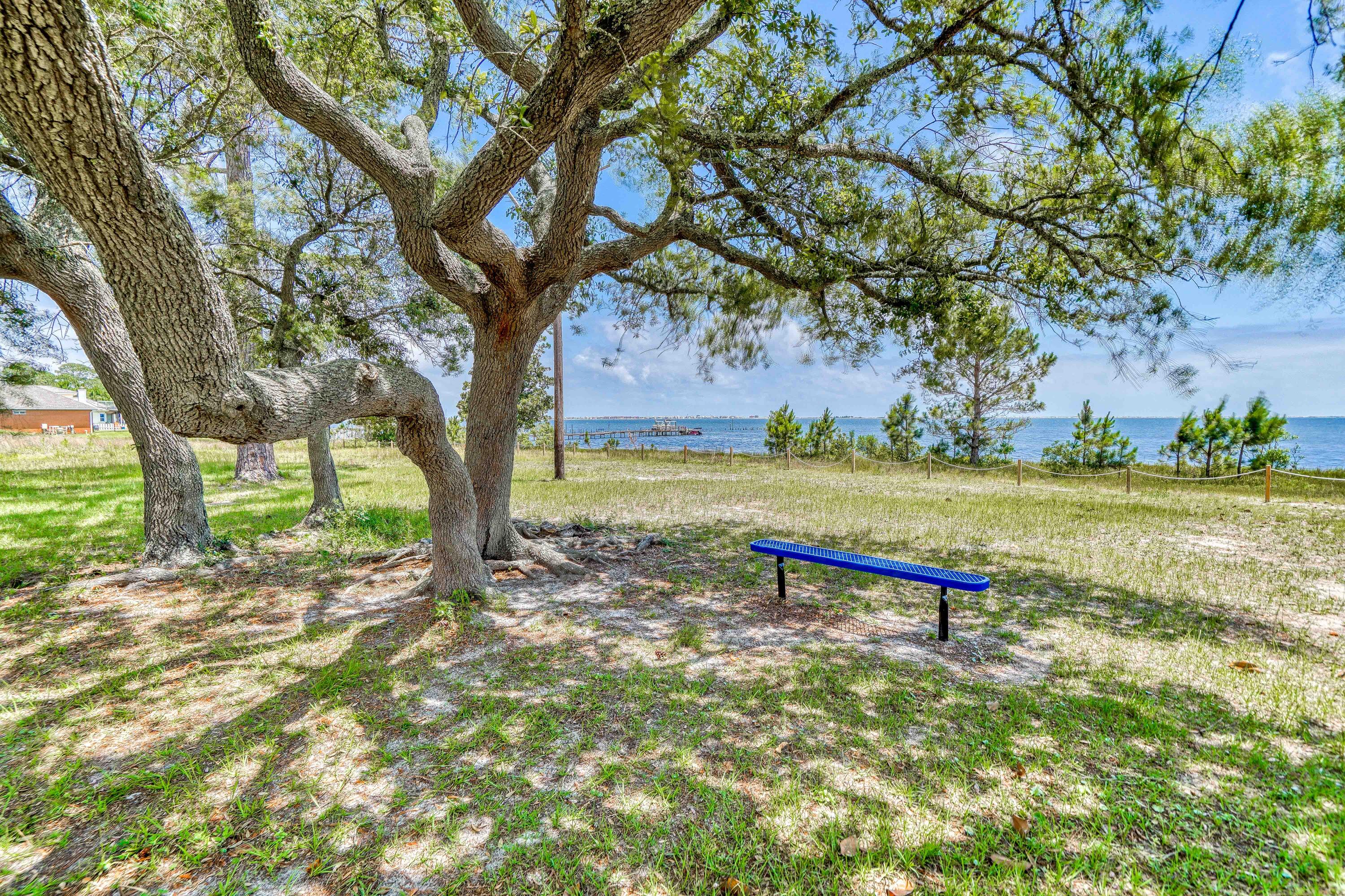 2864 P.G.A Boulevard Navarre, FL 32566 - Photo 46 of 52 a view of a park with large trees