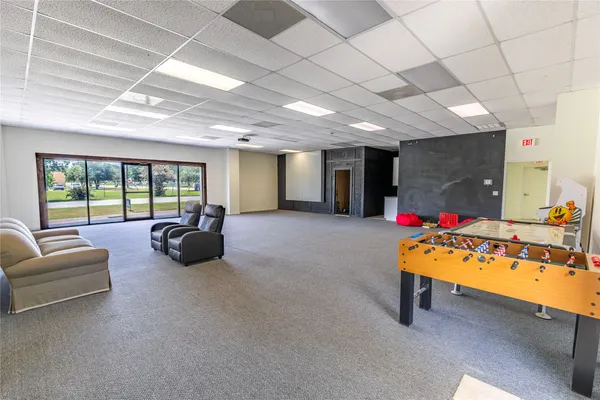 a view of living room with furniture and a couch