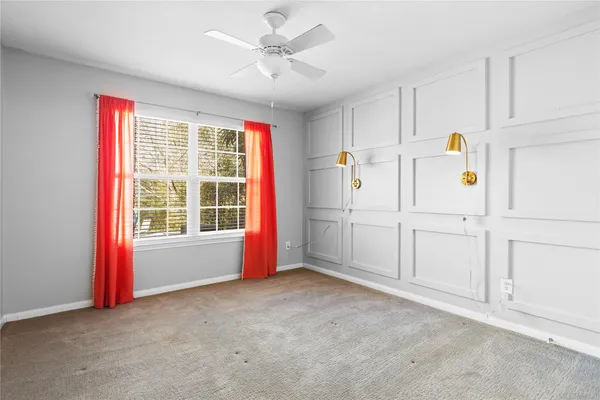 a view of a kitchen with refrigerator and cabinet