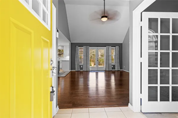a view of an empty room with windows