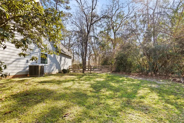 a view of yard with trees