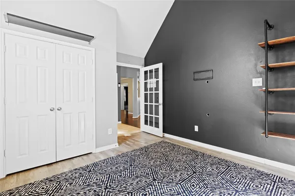 a view of a hallway with closet