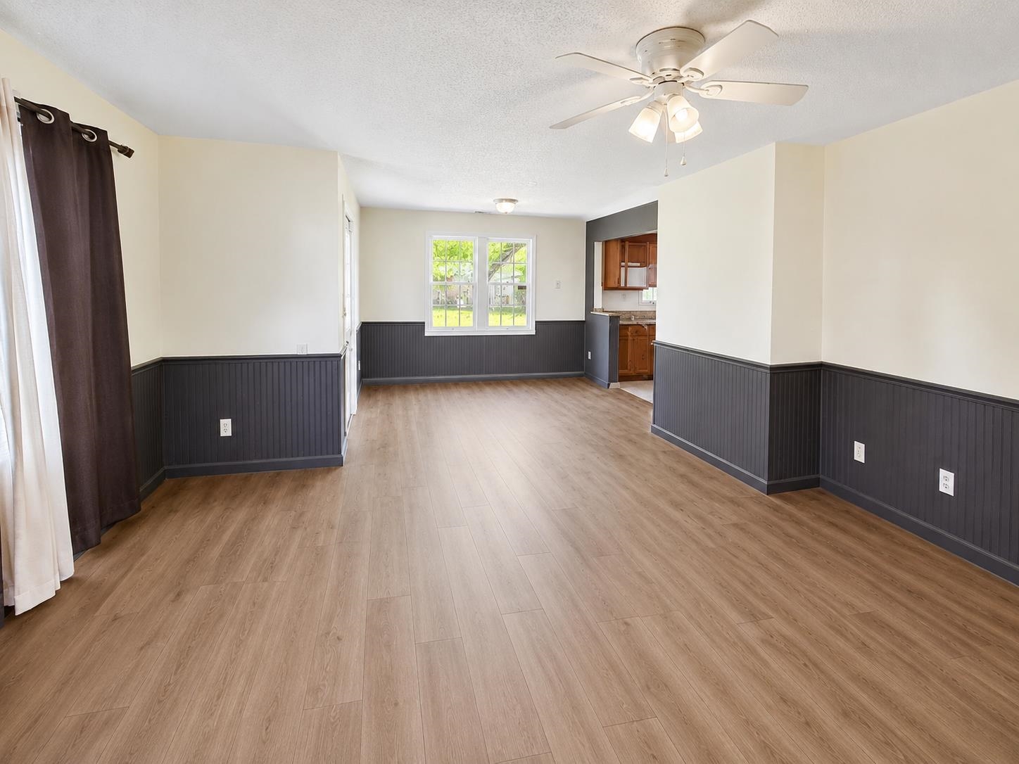 8488 Quito Road Millington, TN 38053 - Photo 7 of 30 wooden floor in an empty room with a window