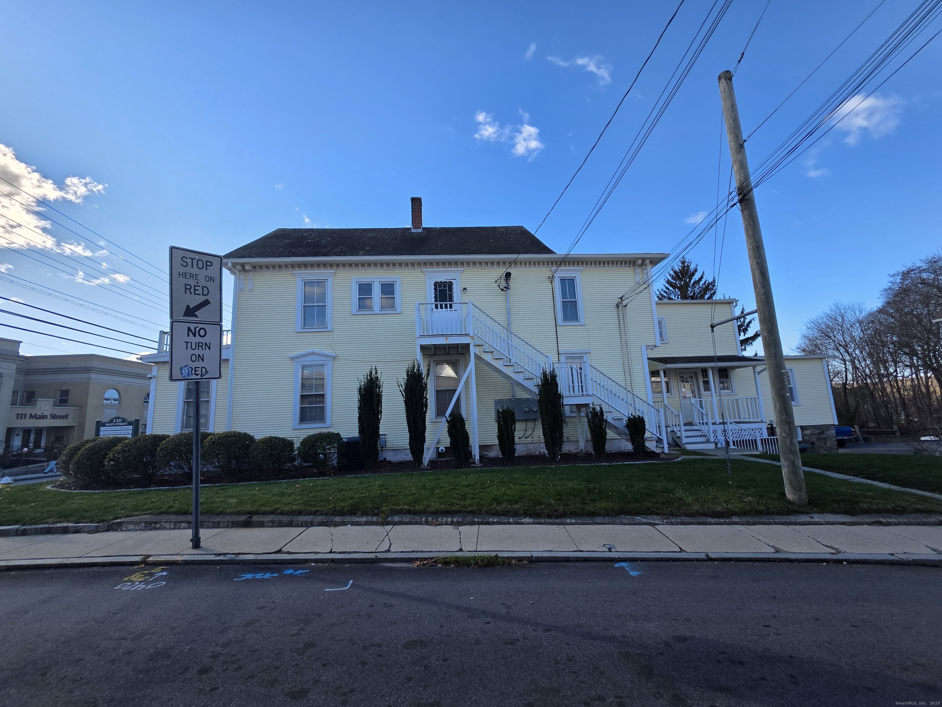 110 Main Street Griswold, CT 06351 - Photo 1 of 32 a view of a big house with a yard