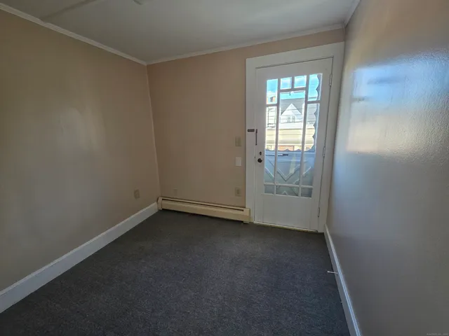 a view of empty room with windows