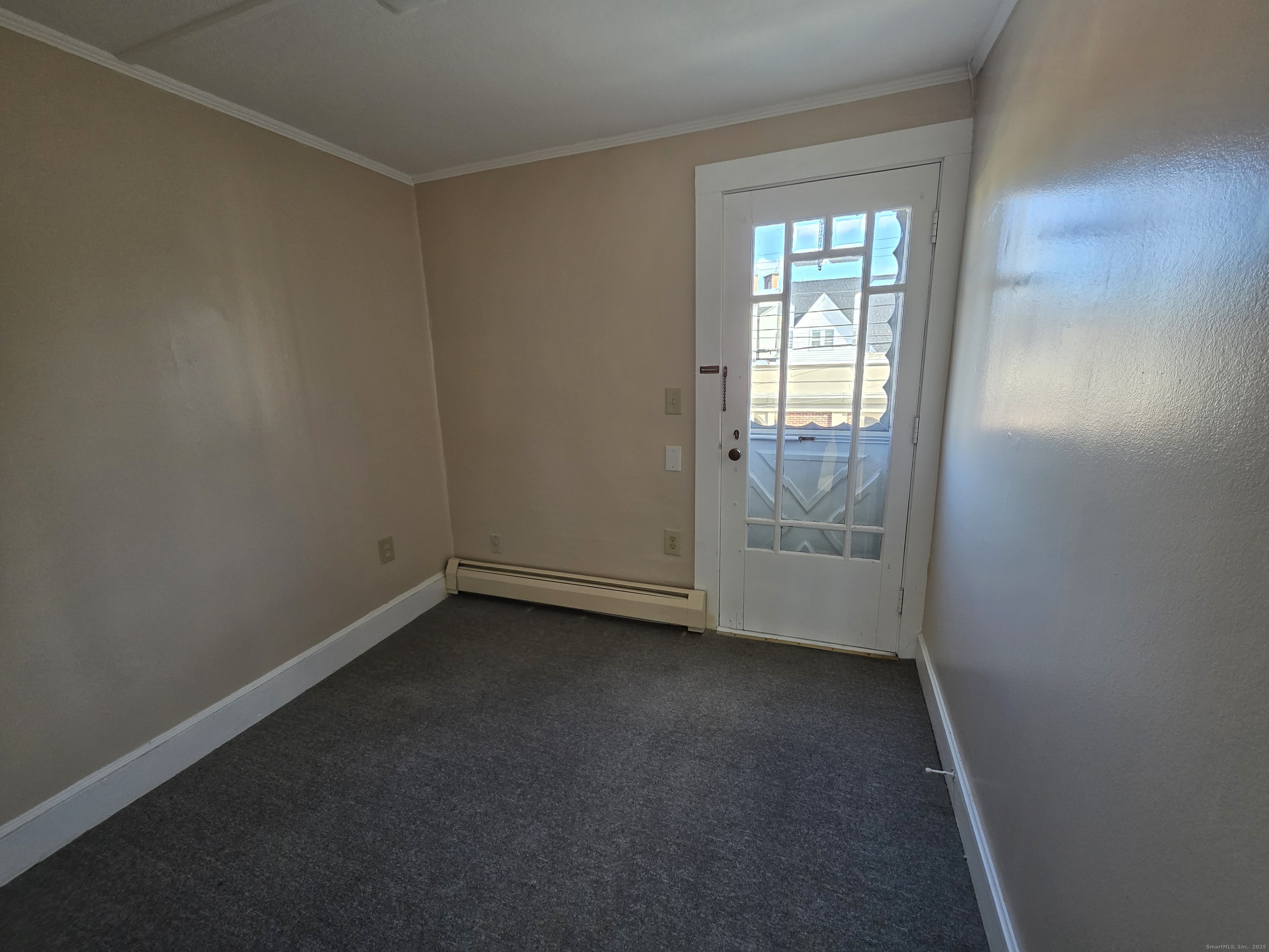 110 Main Street Griswold, CT 06351 - Photo 18 of 32 an empty room with windows