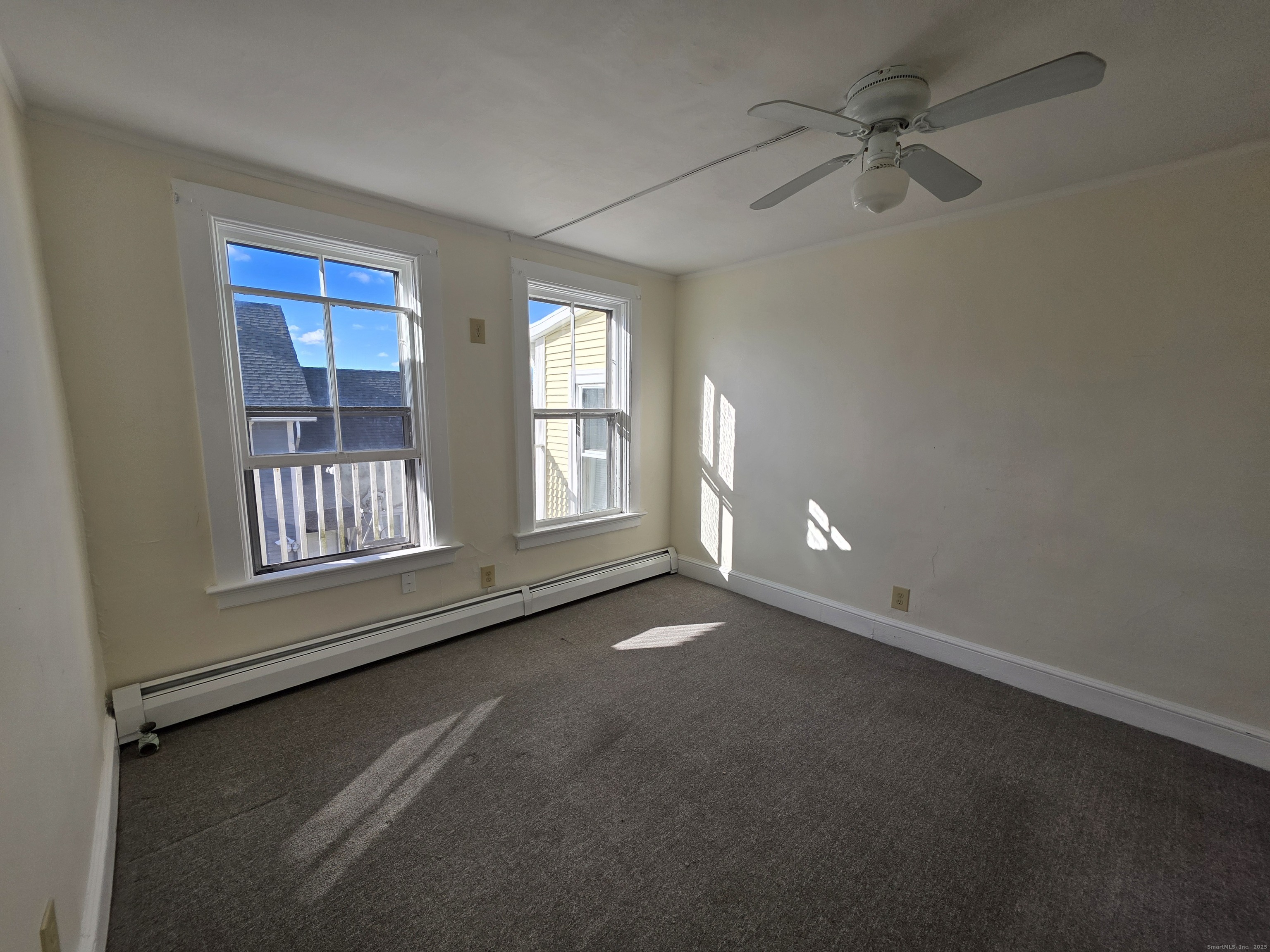 110 Main Street Griswold, CT 06351 - Photo 25 of 32 a view of an empty room with a window