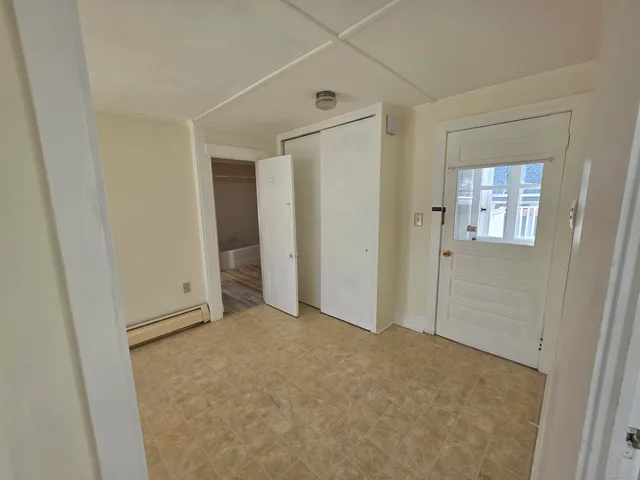 an empty room with windows